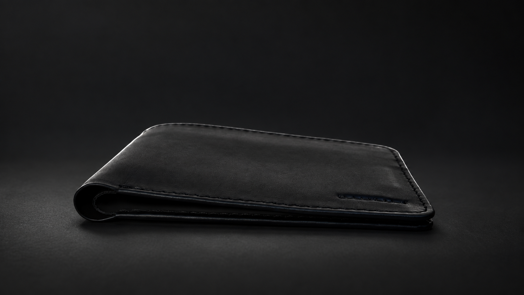 The black wallet seen from its side